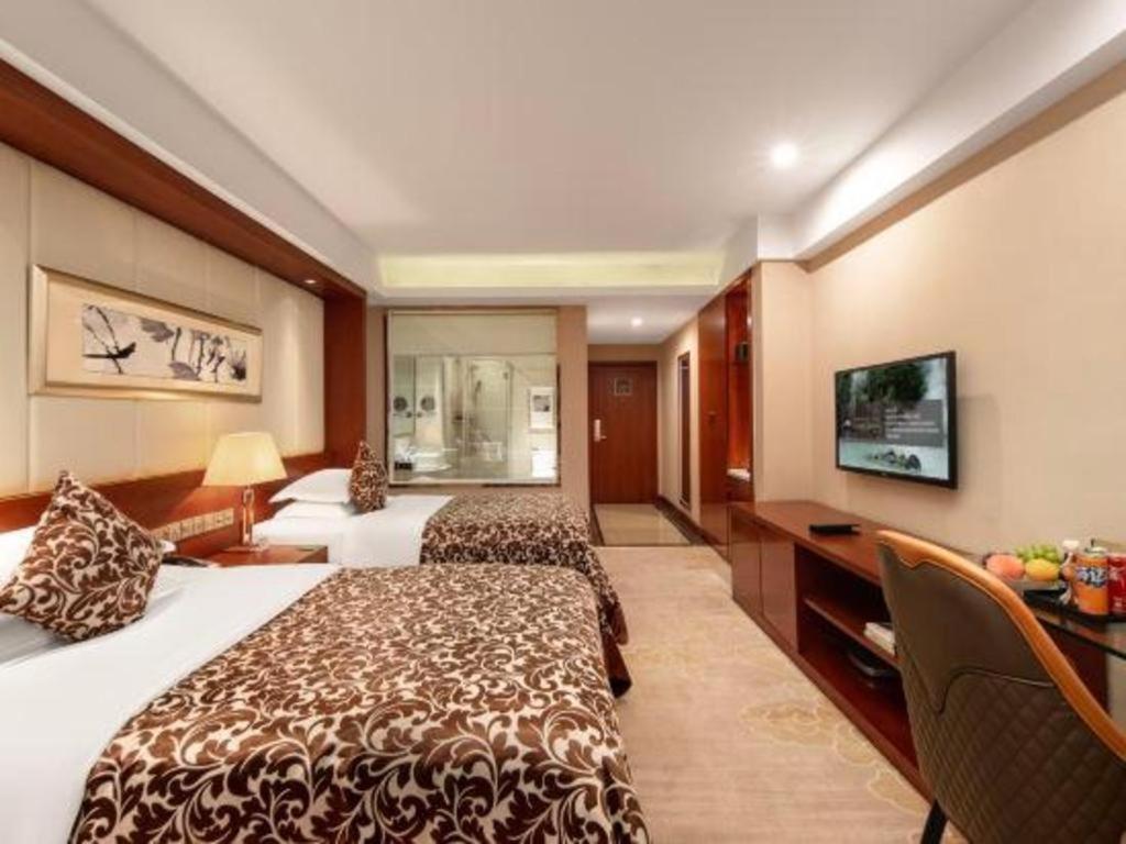 โรงแรมแกรนด์ เมโทรพาร์ค ซางชิว Shangqiu ภายนอก รูปภาพ