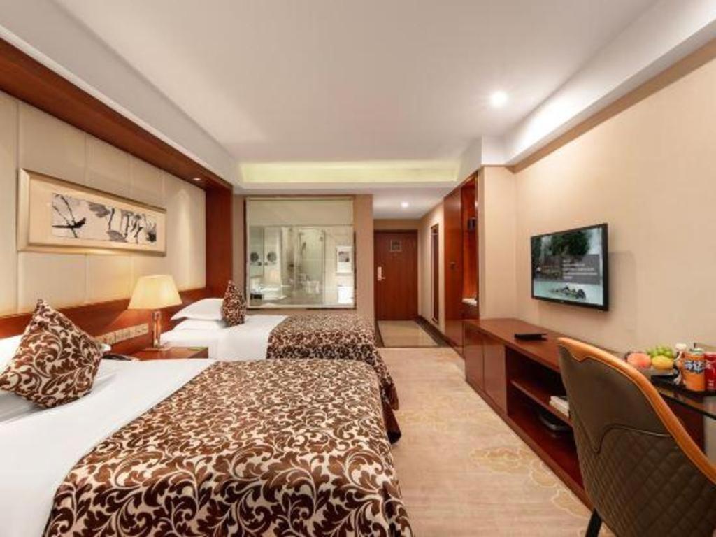 โรงแรมแกรนด์ เมโทรพาร์ค ซางชิว Shangqiu ภายนอก รูปภาพ